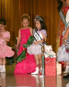Tiny Miss Calyne Phung being crowned